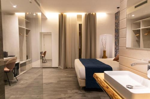 Postel nebo postele na pokoji v ubytování Porta Vetere - Boutique Rooms