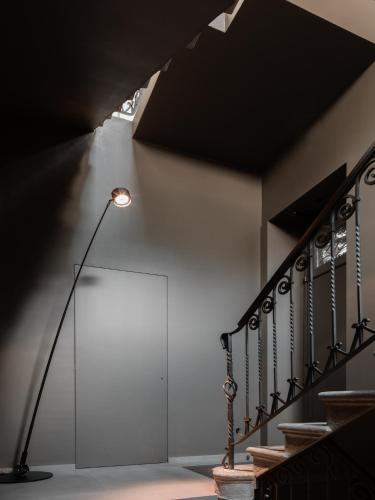 a street light in a room with a stair case at DIMORA1934 Relax&Comfort in Tirano