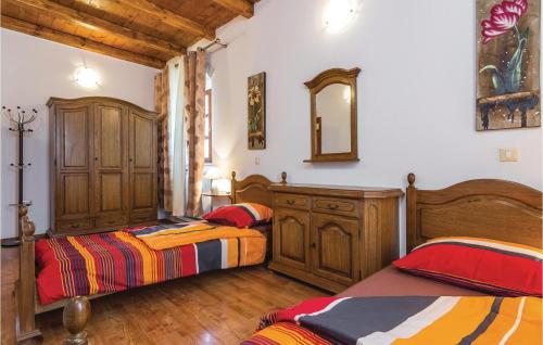 Posteľ alebo postele v izbe v ubytovaní Lovely Home In Modrusani With House A Panoramic View
