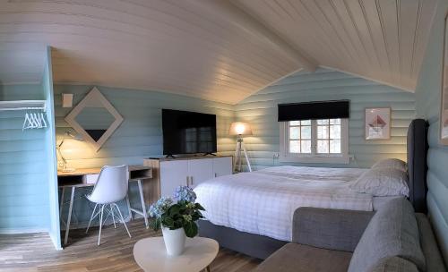 Кровать или кровати в номере Neset Skydsstasjon