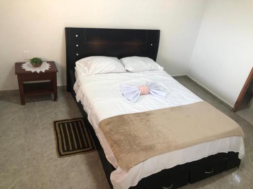 Ένα ή περισσότερα κρεβάτια σε δωμάτιο στο Cabaña Millan