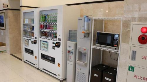 a row of vending machines in a store at Toyoko Inn Hokkaido Sapporo-eki Kita-guchi in Sapporo