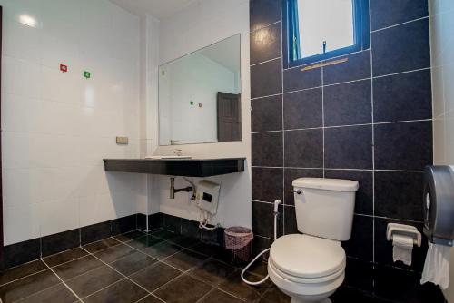 a bathroom with a toilet and a sink at Sweet Party Hua-Hin Private Poolvilla From beach 3km in Hua Hin