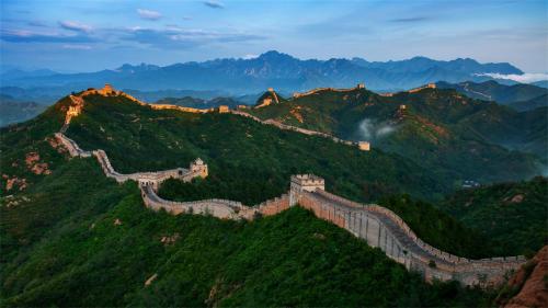 a view of the great wall of china at dusk at Marco Polo Parkside, Beijing in Beijing