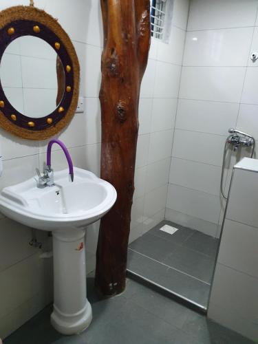 Vonios kambarys apgyvendinimo įstaigoje Jambiani Guest Lodge PEMBA