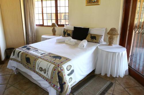 Katil atau katil-katil dalam bilik di Impangele Lodge