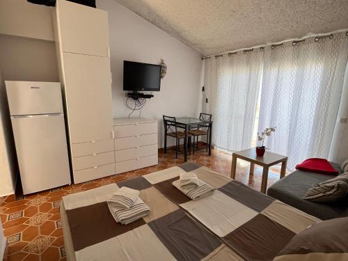 Postel nebo postele na pokoji v ubytování Apartments Bahia Dorada