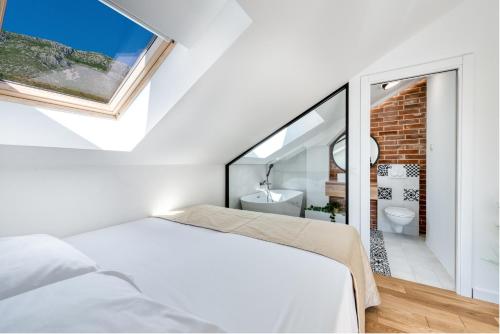 Voodi või voodid majutusasutuse Aria Suite & SPA Dubrovnik toas