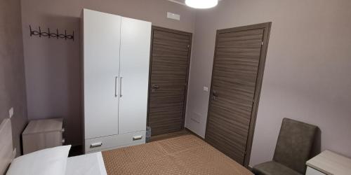 Ένα ή περισσότερα κρεβάτια σε δωμάτιο στο B&B Casa Barone