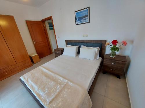 Ένα ή περισσότερα κρεβάτια σε δωμάτιο στο Apocalypsis Studios-Apartments