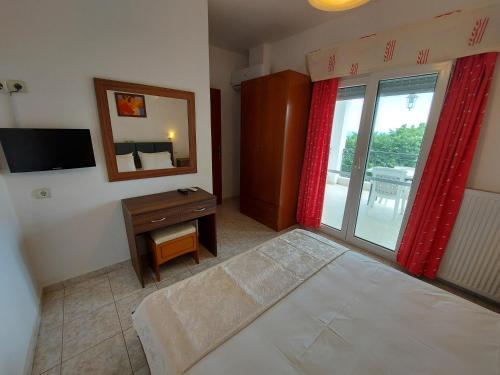 Ένα ή περισσότερα κρεβάτια σε δωμάτιο στο Apocalypsis Studios-Apartments