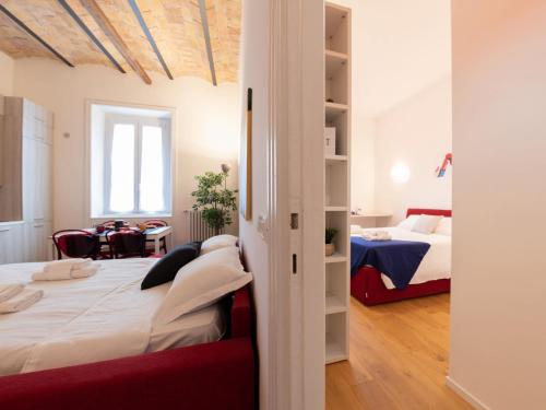 Llit o llits en una habitació de The Best Rent - One-bedroom apartment near San Pietro
