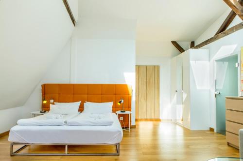 Een bed of bedden in een kamer bij Hotel Villa Vinum Cochem