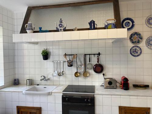 A cozinha ou kitchenette de HyP - La Casa de la Abuela Victoria
