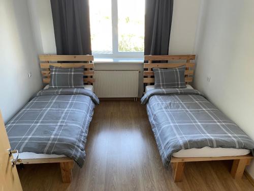 Ein Bett oder Betten in einem Zimmer der Unterkunft Svečių namai prie Širvintų