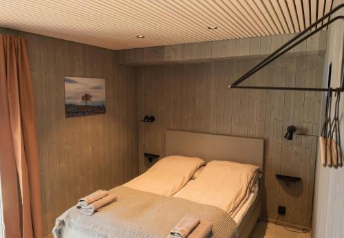Postel nebo postele na pokoji v ubytování Modern apartment in Henningsvær