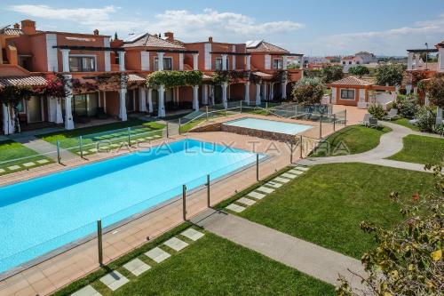 an overhead view of a swimming pool in a house at Casa Lux Tavira in Luz de Tavira