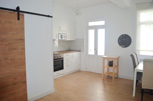 Kuchyň nebo kuchyňský kout v ubytování Apartamento en centro de Ferrol