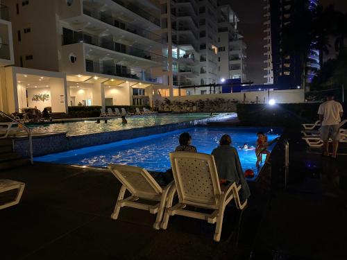 Bazén v ubytování Resort Playa Azul Departamentos nebo v jeho okolí