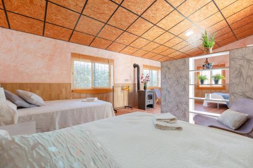 a room with two beds in a room at Fidalsa Sunny Valley in Catral