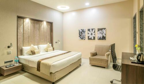 Cama o camas de una habitación en The Citi Residenci Hotel - Durgapur