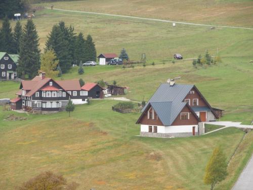 an aerial view of a house on a hill at Berger Pec Privat in Pec pod Sněžkou