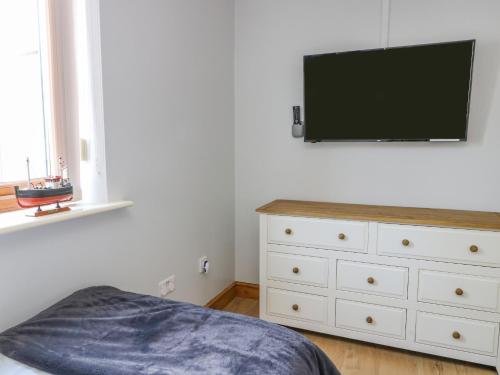 TV a/nebo společenská místnost v ubytování Aurora