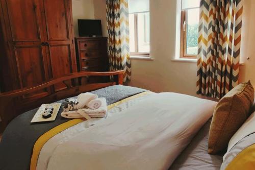 En eller flere senge i et værelse på 'Kealan' Luxury Double Room