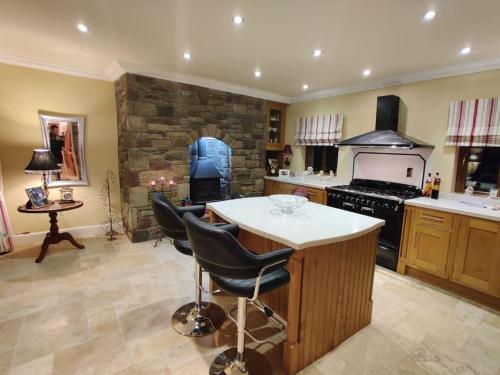 Una cocina o zona de cocina en 'Kealan' Luxury Double Room