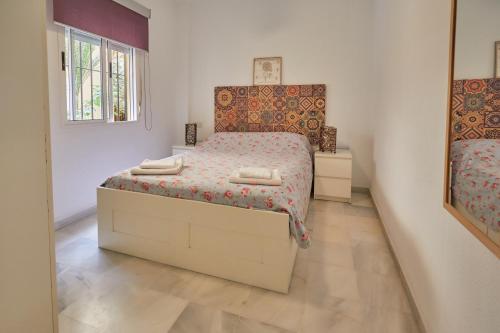 A bed or beds in a room at Two Bedrooms Leonor Davalos 2
