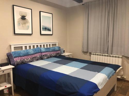 מיטה או מיטות בחדר ב-Casa Calvés
