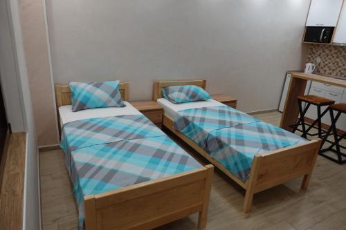 Postel nebo postele na pokoji v ubytování STIV Apartmani