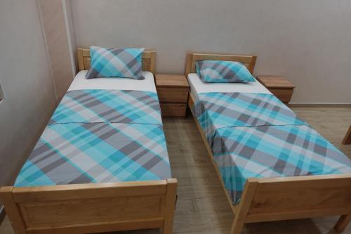 Postel nebo postele na pokoji v ubytování STIV Apartmani