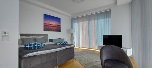 TV a/nebo společenská místnost v ubytování Ringi Rannakivi Residents