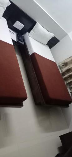 a pair of scissors sitting on top of a table at Homestayinn in Ahmedabad
