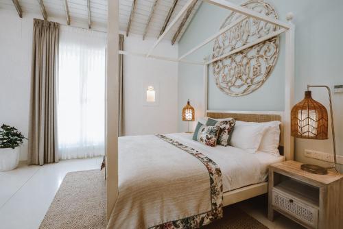 Ein Bett oder Betten in einem Zimmer der Unterkunft Selenya Talpe - Boutique Villa