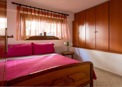 Postel nebo postele na pokoji v ubytování Thodoros apartment