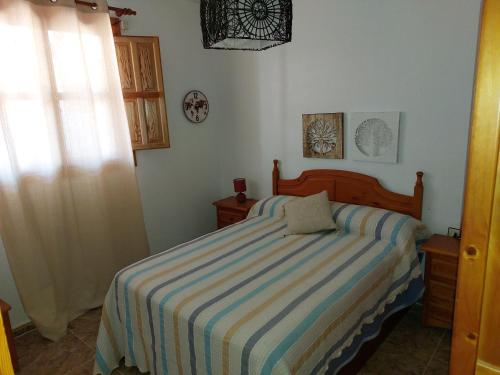 Posteľ alebo postele v izbe v ubytovaní Apartamento Rey Melchor