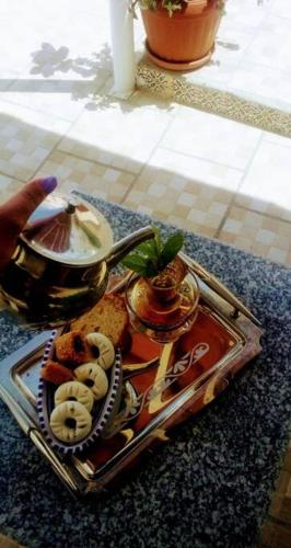 a tray of food on top of a table at Dar Tata in Nabeul