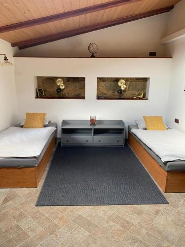 Postel nebo postele na pokoji v ubytování Apartmany Vila Lucia 6