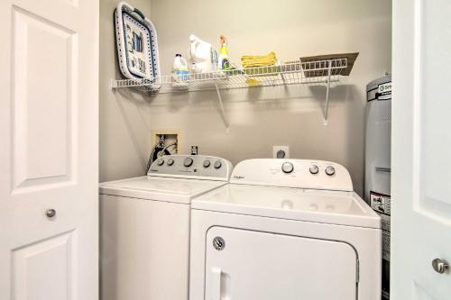 a laundry room with a washer and dryer at Water Access, Sunroom Ocean View Escape! in Ocean View