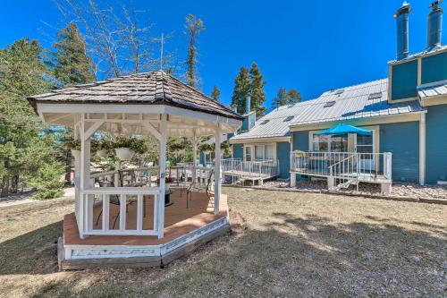 a gazebo in the yard of a house at Eclectic Home with Deck 4 Miles to Ski Cloudcroft! in Cloudcroft