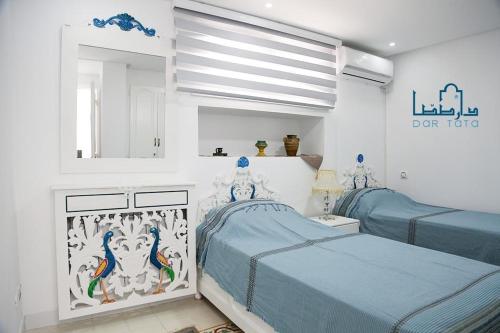 Cama o camas de una habitación en Dar Tata