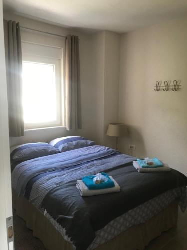Postel nebo postele na pokoji v ubytování Villa Mariva