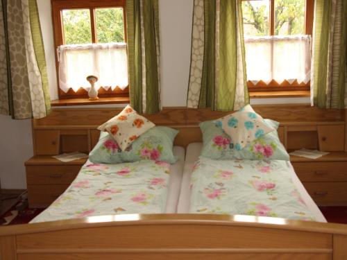 מיטה או מיטות בחדר ב-Ferienhaus Stockmeier