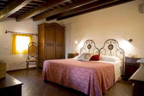 เตียงในห้องที่ B&B Sabir