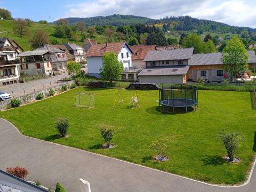 an aerial view of a yard with a playground at Le gîte des Kritter in Stosswihr