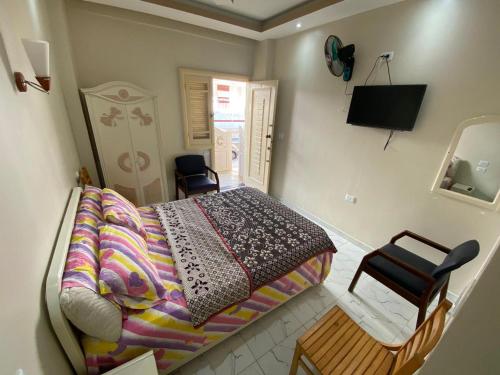 Een bed of bedden in een kamer bij Villa 32 - Marouf Group