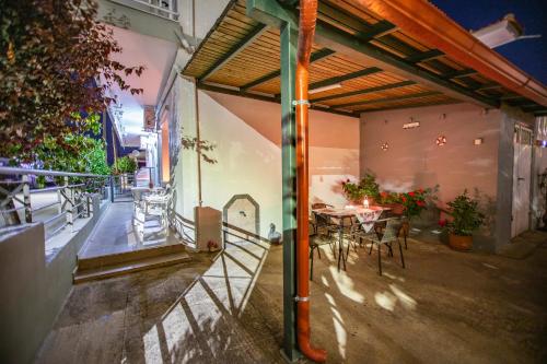 A patio or other outdoor area at Vordos Rooms