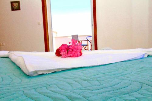 Ένα ή περισσότερα κρεβάτια σε δωμάτιο στο Villa Itilo